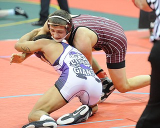 Mario Graziani of Boardman attempts to take the back of Trey Grine of Fremont Ross during their 145lb Division 1 championship bracket bout during the State High School Wrestling meet on February 27, 2014 at Jerome Schottenstein Center in Columbus, Ohio.