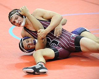 Mario Graziani of Boardman scores points with a near fall of Trey Grine of Fremont Ross during their 145lb Division 1 championship bracket bout during the State High School Wrestling meet on February 27, 2014 at Jerome Schottenstein Center in Columbus, Ohio.