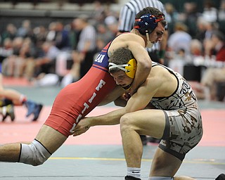 Camran Rezapourian of Fitch attempts to take down Jakob Hinz of Westerville North during their 170lb Division 1 championship bracket bout during the State High School Wrestling meet on February 27, 2014 at Jerome Schottenstein Center in Columbus, Ohio.