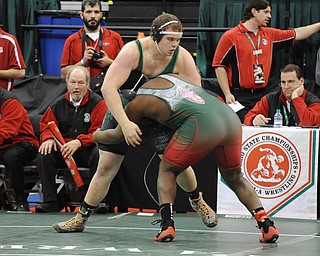 COLUMBUS, OHIO - FEBRUARY 28, 2014:Logan Sharp of West Branch stuffs a take down attempt from Jquan Fisher of Toledo Central Catholic during their 285lb championship bracket bout during the 2014 division 2 state wrestling tournament at Schottenstein Center.