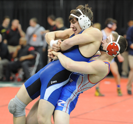 COLUMBUS, OHIO - FEBRUARY 28, 2014: Mike Audi of Poland is picked up by Zeck Lehman of Revere before being slammed to the ground.