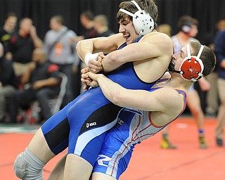 COLUMBUS, OHIO - FEBRUARY 28, 2014: Mike Audi of Poland is picked up by Zeck Lehman of Revere before being slammed to the ground.