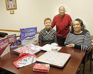 Protestant Family Service, which is marking its 70th year, is promoting its third annual Scrabble tournament Saturday at Bethel Lutheran Church in Boardman. From left are Jean Montgomery, administrative aide; Jacqueline Burley, executive director; and the Rev. Gwendolyn Johnson, president of the PFS board.