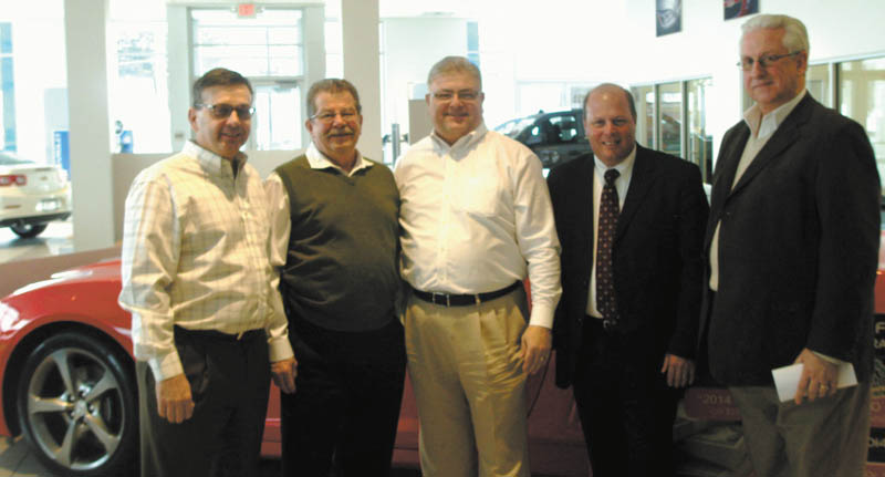 SPECIAL TO THE VINDICATOR
Those involved in organizing the 25th annual Strimbu Memorial Banquet are, from left, Jim Grasso, vice president of the Strimbu Memorial Fund Board and chairman of the car raffle; Paul O’Brien, president of the board; Thom Kwolek, new car manager at Mel Grata Chevrolet; Bill Strimbu, secretary of the board; and John Holliday, ticket chairman.