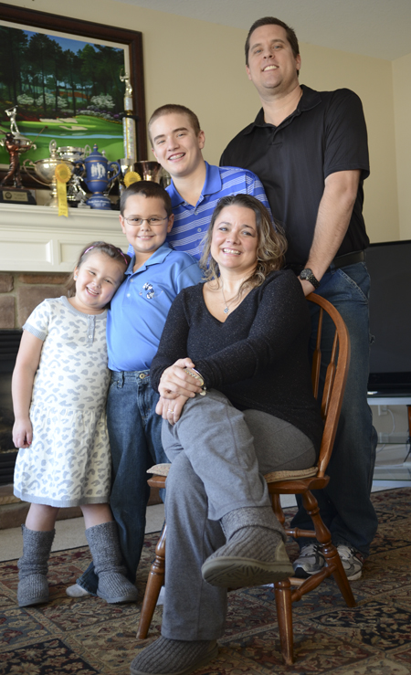 Katie Rickman | The Vindicator.The Terlesky family poses in their Boardman home Thursday, March 6, 2014...Standing L-R .Emma 5, Tyler 9, Brian Jr. 14, and Brian Sr..Seated: Christie Terlesky