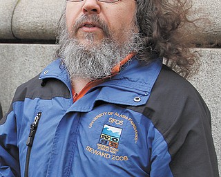YSU professor Ray Beiersdorfer spoke Wednesday at a downtown news conference organized by Frackfree Mahoning Valley.
