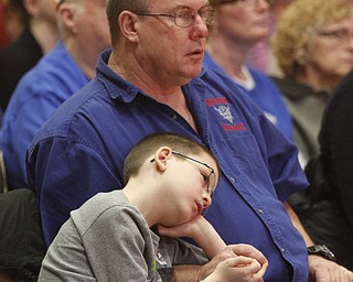  .          ROBERT  K. YOSAY | THE VINDICATOR.. SaturdayÕs 81st Vindicator Regional Spelling Bee...Watching and listening is Jay (8) Meehan and his dad Gary  - they were watching Collin Meehand  from Western Reserve Elementary..-30-