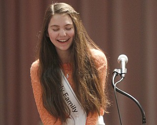  .          ROBERT  K. YOSAY | THE VINDICATOR..Faces -- Audra Pesko -Holy Family ( poland) Gets a chuckle as she finishes -6th grade..-30-