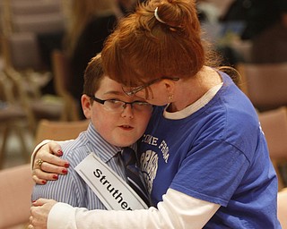  .          ROBERT  K. YOSAY | THE VINDICATOR.. SaturdayÕs 81st Vindicator Regional Spelling Bee.. Good luck hugs as  Andrea McKenna gives her son reassurance before the start of the Bee -   Cole McKenna was from Struthers Middle School and finished in the top 10..-30-