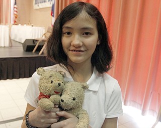  .          ROBERT  K. YOSAY | THE VINDICATOR..Annabelle wither her pooh bear goodlluck charms....Annabelle Day outspelled 50 other Mahoning Valley middle and elementary school students to earn the title Grand Champion in SaturdayÕs 81st Vindicator Regional Spelling Bee..She correctly spelled ÒyesteryearÓ to capture the win..Annabelle, 12, of Boardman, a seventh-grader at Willow Creek Learning Center in Boardman, was competing for the first time this year.t...-30-