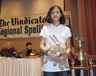  .          ROBERT  K. YOSAY | THE VINDICATOR..Annabelle wither her pooh bear goodlluck charms....Annabelle Day outspelled 50 other Mahoning Valley middle and elementary school students to earn the title Grand Champion in SaturdayÕs 81st Vindicator Regional Spelling Bee..She correctly spelled ÒyesteryearÓ to capture the win..Annabelle, 12, of Boardman, a seventh-grader at Willow Creek Learning Center in Boardman, was competing for the first time this year.t...-30-