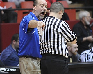 CANTON, OHIO - MARCH 15, 2014: Coach Ken Grisdale of Poland pleads his case to the official after a call during the second half of the regional final game Saturday afternoon at the Canton Civic Center.