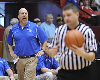 CANTON, OHIO - MARCH 15, 2014: Coach Ken Grisdale of Poland pleads his case to the official after a call during the second half of the regional final game Saturday afternoon at the Canton Civic Center.