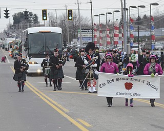 Katie Rickman | The Vindicator.The Red Hackle Pipes and Drums from Cleveland march the parade route during the St. Patrick's Day Parade in Boardman Sunday afternoon.
