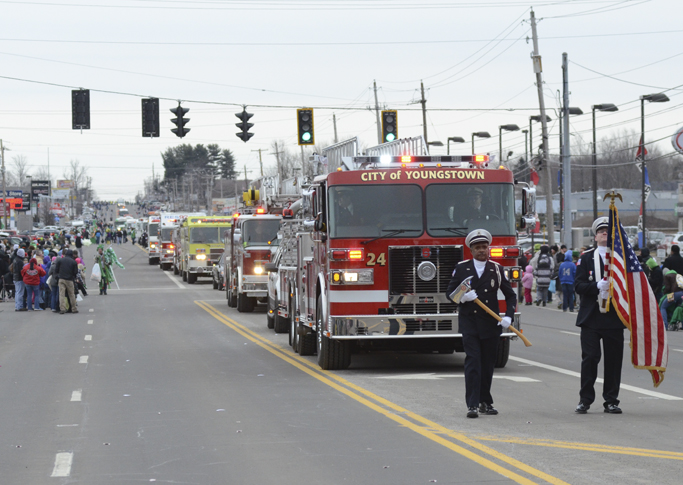 Katie Rickman | The Vindicator.Fire trucks proceed down the parade route during the St. Patrick's Day Parade in Boardman Sunday afternoon.
