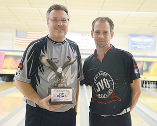 Eugene McCune, left, won first place at the PBA Hubbard Open on Sunday at Bell-Wick Bowl. Michael Machuga took second place.