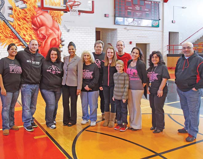 These people are all involved with Sink for Pink, a three-on-three basketball tournament in which all proceeds benefit cancer patients. This year’s event is scheduled for March 29 at Campbell Memorial High School. From left are Angela Rodriguez; David Rodriguez; Andrea Repasky, founder of Sink for Pink; Jacquelyn Hampton, high-school principal; Karen Repasky, Andrea’s mother; Tom Repasky, Andrea’s father; Janna Jackson, 12; Don Jackson; Jacob Jackson, 10; Annette Tovarnak ; Melina Lipinski; and Nick Galantis.