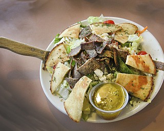 The gyro salad is just one of the menu items that reflect the Greek heritage of owner Gus Kouvas.