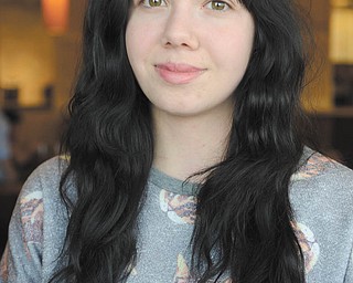 Hayley Shasteen of Berlin Center is a 16-year-old photographer who doesn't like to follow conventional rules regarding photography techniques. Photo by Katie Rickman | The Vindicator