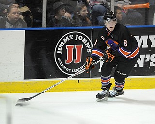 YOUNGSTOWN, OHIO - MARCH 21, 2014: Josh Melnick #8 of the Phantoms skates with the puck during the 3rd period of Friday morning against Team USA at the Covelli Centre. The Phantoms won 7-3.