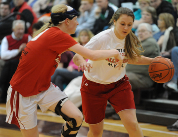 David W. Dermer | The Vindicator
BOARDMAN, OHIO - MARCH 26, 2014: Cassie Custer #15 from Fitch looks for a lane to the basket inside of Sarah Cash #20 from Lordstown  during the 2014 Al Beach All Star game Wednesday night at Boardman High School. ..