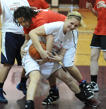 David W. Dermer | The Vindicator
BOARDMAN, OHIO - MARCH 26, 2014: Kelly Tomcsanyi #31 of Boardman and Bree Bishop #32 of Girard battle for a loose ball under the basket after a missed shot during the 2014 Al Beach All Star game Wednesday night at Boardman High School.