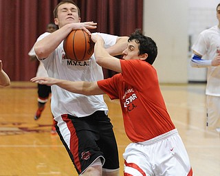 David W. Dermer | The Vindicator
BOARDMAN, OHIO - MARCH 26, 2014: Evan Standohar #2 go Girard slaps the gal out of the hands of Max Wolfgang #32 of Salem during the 2014 Al Beach All Star game Wednesday night at Boardman High School. ..