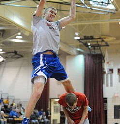David W. Dermer | The Vindicator
BOARDMAN, OHIO - MARCH 26, 2014: Peyton Aldridge of LaBrae dunks the basketball over Collin Phillips of LaBrae  during the 2014 Al Beach All Star slam dunk contest Wednesday night at Boardman High School.