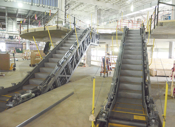 Escalators have been installed to take patrons from the Austintown racino’s main gaming floor to an upstairs sports bar. There also will be a grandstand viewing area for live races in the upstairs section.