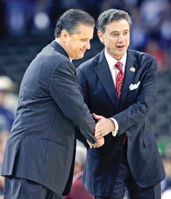 Louisville head coach Rick Pitino, right, shakes hands with Kentucky head coach John Calipari before a 2012 Final Four game in New Orleans. The two teams face off again this year in the Sweet 16, and the Wildcats would love to dash the Cardinals’ dreams of a third straight Final Four appearance.