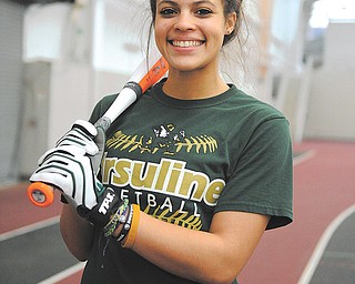 Macey Gunther of Ursuline poses for a headshot during softball practice on Thursday afternoon at the WATTS training facility at Youngstown State.