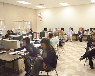 A group of Boardman teachers participates in a training course for Drund at West Boulevard Elementary on March 27. Drund, a locally developed secure social-media platform for schools, was founded locally and operates out of Boardman.