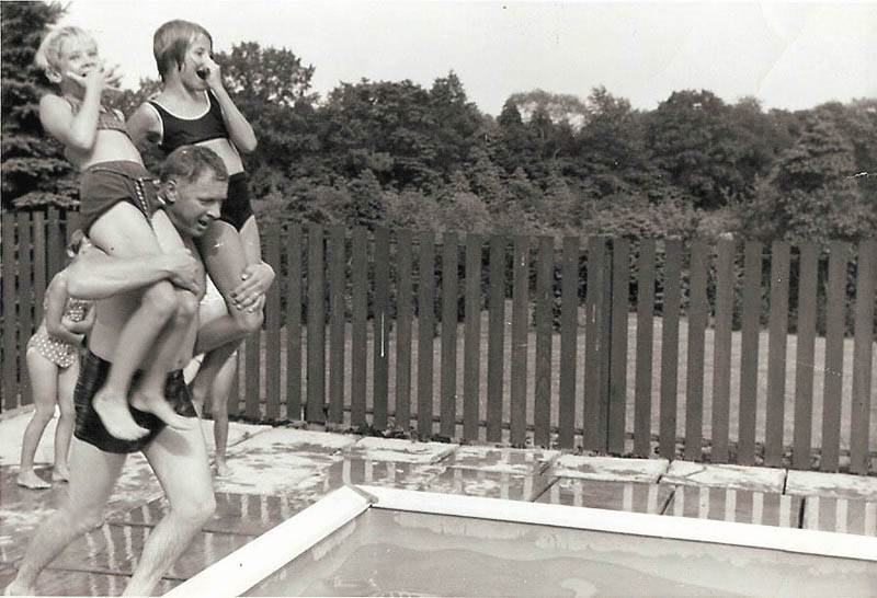 This picture was taken around 1966 by Vera Perun of Monaca, Pa. It includes her daughter, Paula Cavoulas of Canfield, and her cousin Linda Davis Dukavich of Hopewell Twp, Pa. on Paula’s dad’s shoulders as they are about to take the plunge. Paula’s Dad is George Perun.