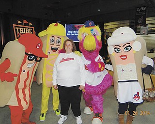 This is Shelly Toth of Austintown with the Cleveland Indians mascots Slider and the Hotdogs, looking forward to opening day. Her husband, Jeff, took this in January at the Tribe Fest at Progressive Field.