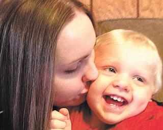 Logan, 18 months, and mom Amanda of Hubbard, being silly and having mommy and son time. Sent by mom, Amanda.