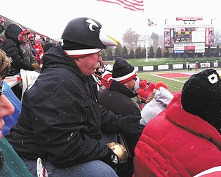 Harold Wilson of Austintown was at the last YSU home game of the 2013 season, just as the snow started falling. He is a BIG BIG fan and will watch those Penguins in any kind of weather. Harold is a retired teacher, and his wife, Kay, who submitted the photo, is a school secretary.