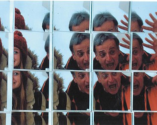 In March Leanna Hartsough and Richard Bucurel enjoyed making funny faces in a mirror at the Butler Art Museum. Photo by Lana VanAuker.