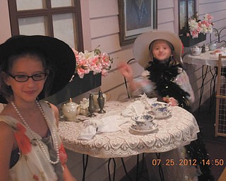 Brittany Gulling and Kimberly Gulling, both of Poland, are properly attired to enjoy a spot of tea. Sent by Sharman Simon.