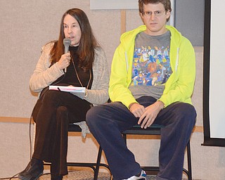 Debra Chwast appears with her son, artist Seth Chwast, at a reception Sunday at the Butler Institute of American Art in Youngstown. Several of the artist’s paintings are on exhibition at the Butler through May 8. Museum hours are 11 a.m. to 4 p.m. Tuesday through Saturday and noon to 4 p.m. Sunday.