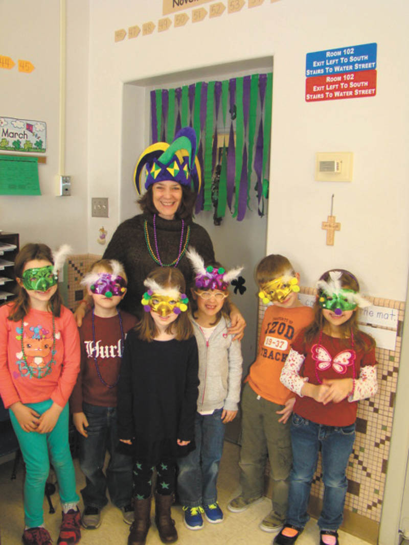 SPECIAL TO THE VINDICATOR
Students in kindergarten and second grade at St. Patrick School in Hubbard celebrated Fat Tuesday in preparation for the Lenten season. The children decorated masks and feasted on treats and beverages throughout the day. Kindergarten student Jayden Stiles passed out colorful beads to all school students before classes began. In back is Barbara Bond, and from left are Sarah Lindholm, Jayden, Ashley Lewis, Aubrey Munnell, Nicholas Markulin and Lia Fiorini.
