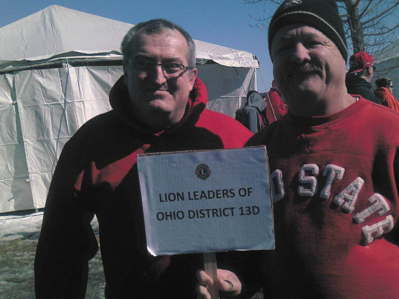 SPECIAL TO THE VINDICATOR
Above, at right, Thomas Zickefoose of Canfield, who is Ohio Lions District 13-D governor, and Robert Allgood of East Liverpool, second vice district governor, joined others at Craig Beach in Lake Milton for the American Cancer Society’s Brrr for a Cure Polar Plunge last month. With the help of other Lions of District 13-D, family and friends, they were able to raise around $1,900 to fight cancer.
