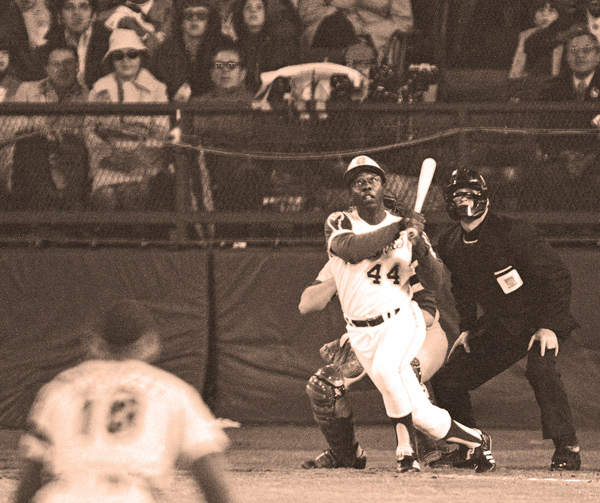 The Braves’ Hank Aaron watches the flight of the ball after hitting his 715th career homer to break Babe
Ruth’s record in a game against the Dodgers in Atlanta. The 40th anniversary of the event will be commemorated
tonight before the Braves’ home opener against the Mets.