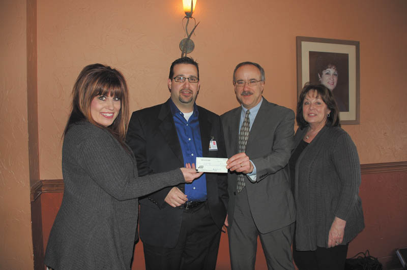 SPECIAL TO THE VINDICATOR
From left, Carolyn Leetch, co-chairwoman of Magic of an Angels Christmas; Jerry Savo, chief financial officer of Easter Seals; Tim Nelson, president and CEO of Easter Seals; and Kathy Carroll, president of Angels of Easter Seals, appeared recently for the presentation of a $50,000 check to Easter Seals, the proceeds from the Magic of the Angels’ Christmas, which took place Nov. 22. 