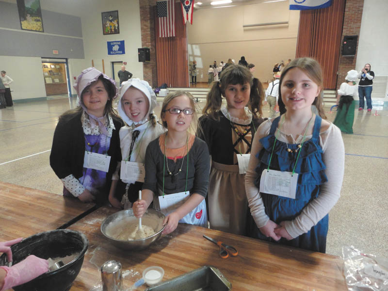 SPECIAL TO THE VINDICATOR
Fourth-grade students at Dobbins Elementary School in Poland recently enjoyed celebrating Pioneer Day, a traditional event for students in that grade. The children dressed as pioneers and participated in many interesting activities throughout the day, such as crafts, games and bread- and butter-making. They learned about pioneers through imitating their daily life. In addition, they performed a square dancing routine for their families. Some of the participants were, from left to right, Alyssa Rapp, Sydney Ohlin, Eliyah Sanchez, Julia Ranno and Hope Sines.