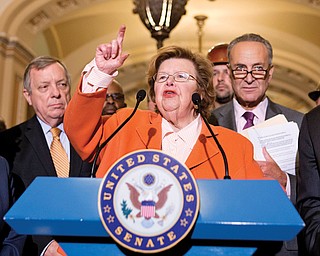 Senate Appropriations Committee Chairwoman Sen. Barbara Mikulski, D-Md., flanked by Senate Majority Whip Richard Durbin of Illinois, left, and Sen. Charles Schumer, D-N.Y., speaking on Capitol Hill in Washington. Senate Republicans derailed a Democratic bill Wednesday curbing paycheck discrimination against women, an effort that even in defeat Democrats hoped would pay political dividends in this fall’s congressional elections. Mikulski is the bill’s sponsor.