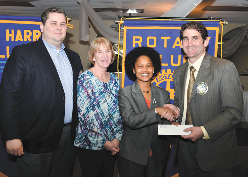 SPECIAL TO THE VINDICATOR
At the March 19 meeting of the Rotary Club of Warren, President John Campolito presented a check for $10,000 to Kenya Roberts-Howard, YWCA executive director, and Shari Harrell, past YWCA executive director. The check is the final installment of a pledge made three years ago toward the YWCA’s building/renovation drive. Harrell secured the $30,000 pledge from the Rotary Club of Warren in 2012. The pledge helped to fund construction of a project that will provide safe housing for women in transition. Harrell is the president and CEO of the Community Foundation of the Mahoning Valley. From left to right are Nick Odille, past president of Rotary of Warren; Harrell; Roberts-Howard; and Campolito.