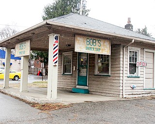 Bob’s Barber Shop, above, at Glenwood and West Judson avenues on Youngstown’s South Side is a throwback to a simpler time. The building formerly was a gas station that closed in 1966. Owner Bob Toth opened the barbershop in 1973 and has been cutting hair there ever since.