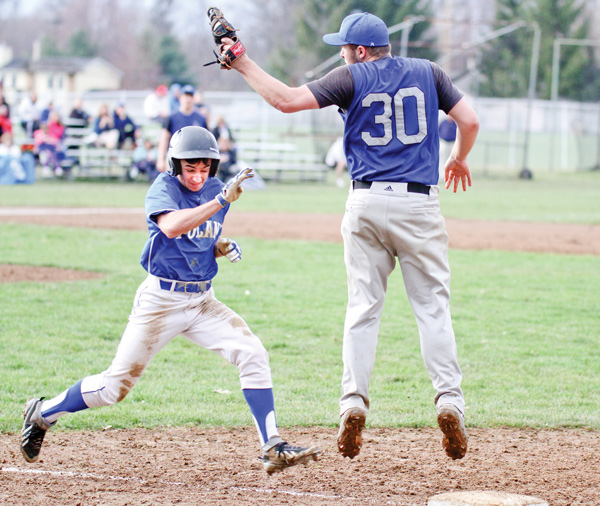 Poland’s Chase Knodle, left, is about to be tagged out at first by Lakeview’s Anthony Senter (30) during Monday’s action in Cortland.