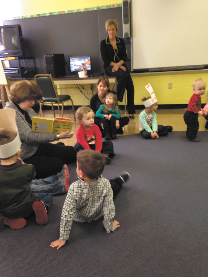SPECIAL TO THE VINDICATOR
The Mommy and Me Class at the Early Childhood Learning Center at St. Luke School, 5235 South Ave. in Boardman, recently celebrated Dr. Seuss. These students are listening to “One Fish, Two Fish, Red Fish, Blue Fish.” Their teacher is Anne St. George. 