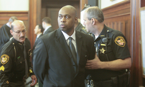 Willie Gene Wilks Jr. looks at his family as deputies prepare to lead him out of the courtroom after a jury convicted him Tuesday of aggravated murder with a death-penalty specification.